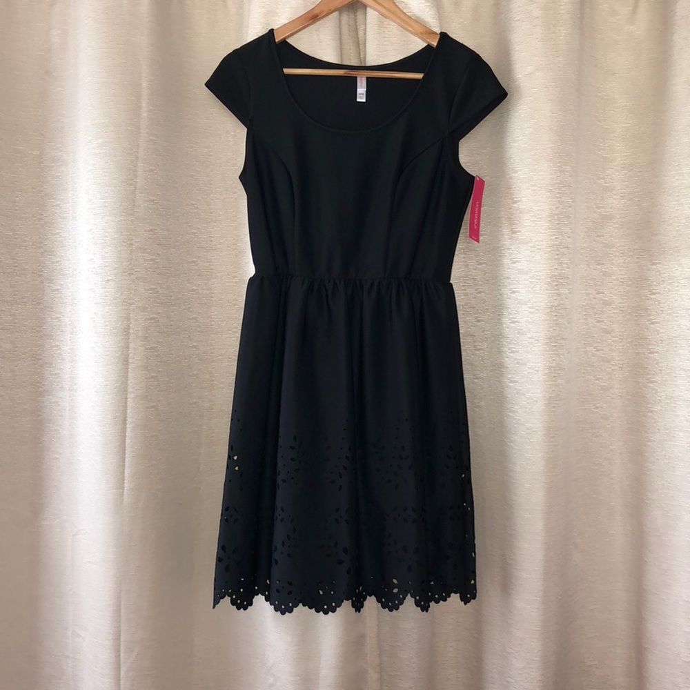 LBD - cap sleeve with cut out hem detail